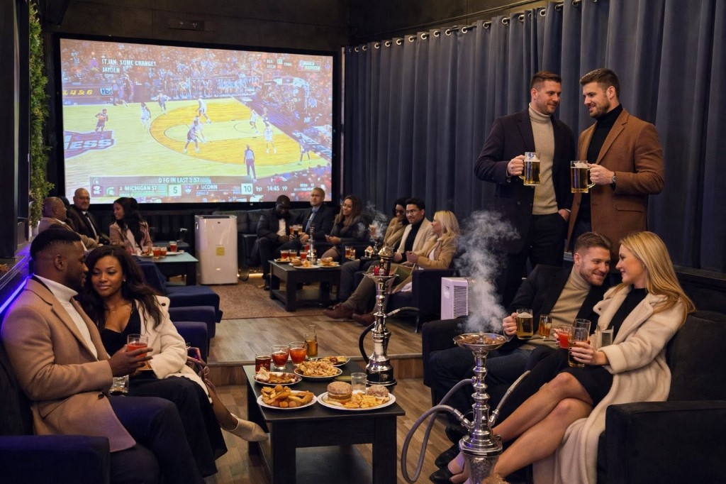 Air-conditioned covered patio lounge with seating, hookah, and sports on screen at Twisted Bar and Grill
